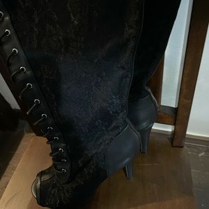 Heeled peek toe knee high lace boots